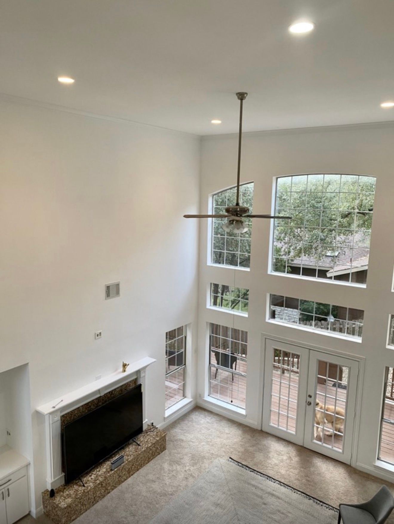 Interior painting project in West Austin completed before the homeowner returned for exterior painting