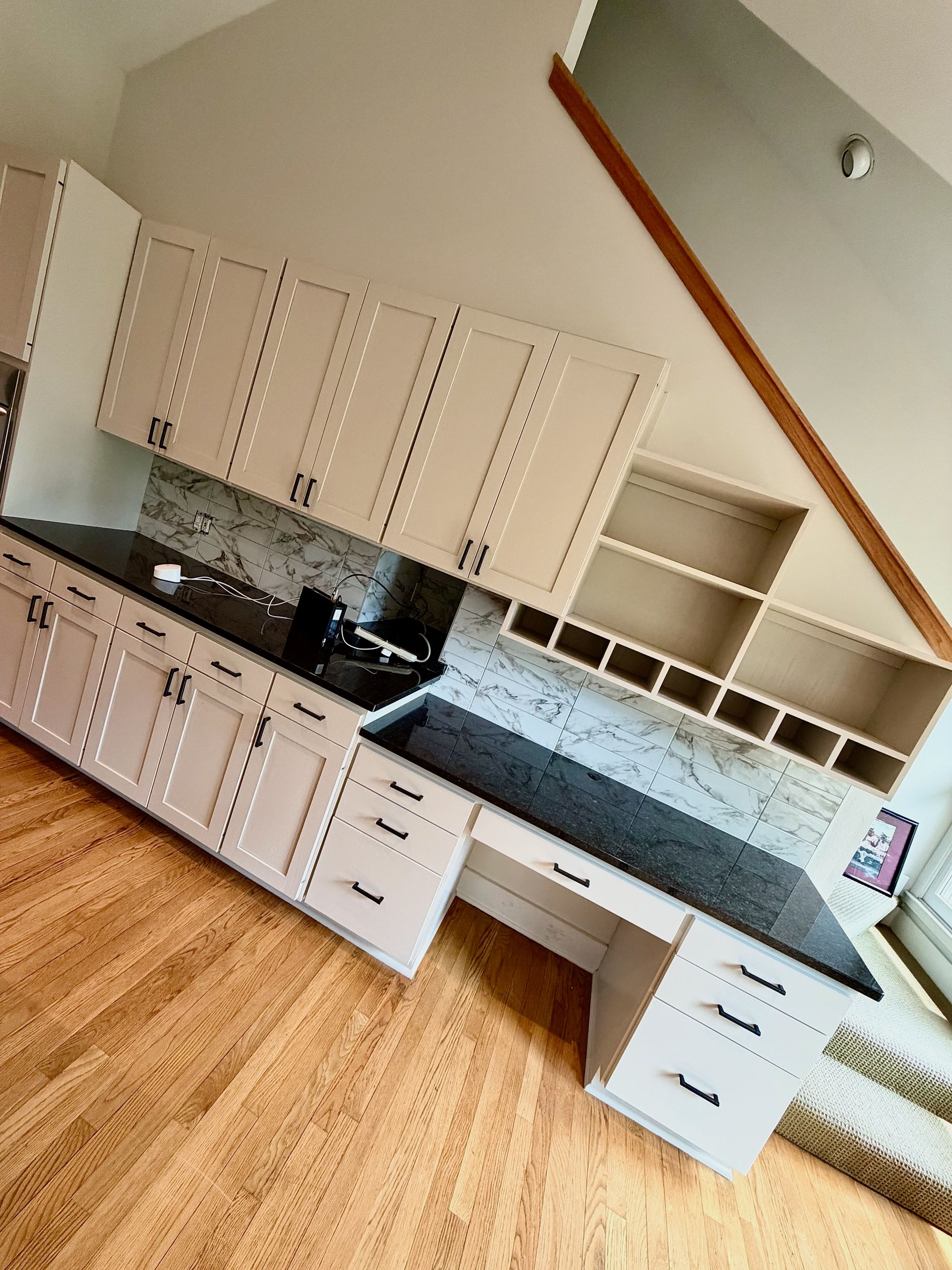 Westlake Hills kitchen remodel with Edgecomb Gray painted cabinets and Iron Mountain island