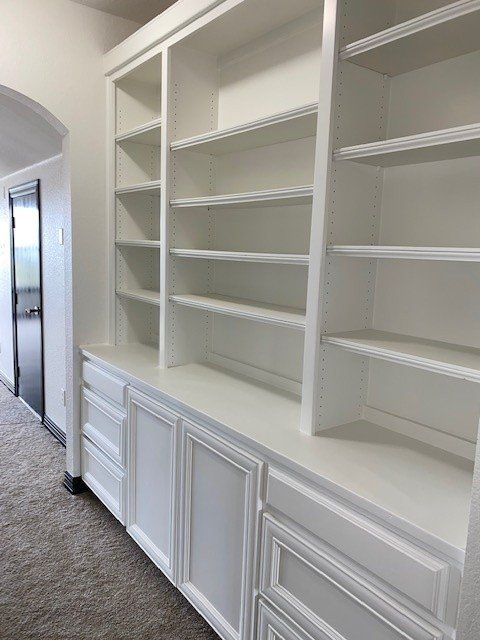 Home in Lake Travis area of Austin, TX that had whole house cabinet painting and cabinet staining completed by Austin Painting and Cabinets