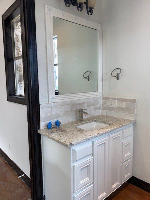 Home in Lake Travis area of Austin, TX that had whole house cabinet painting and cabinet staining completed by Austin Painting and Cabinets