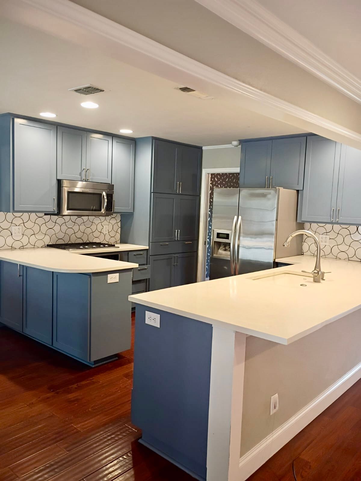 Cabinet painting project in Northwest Hills Austin completed before the homeowner returned for exterior painting