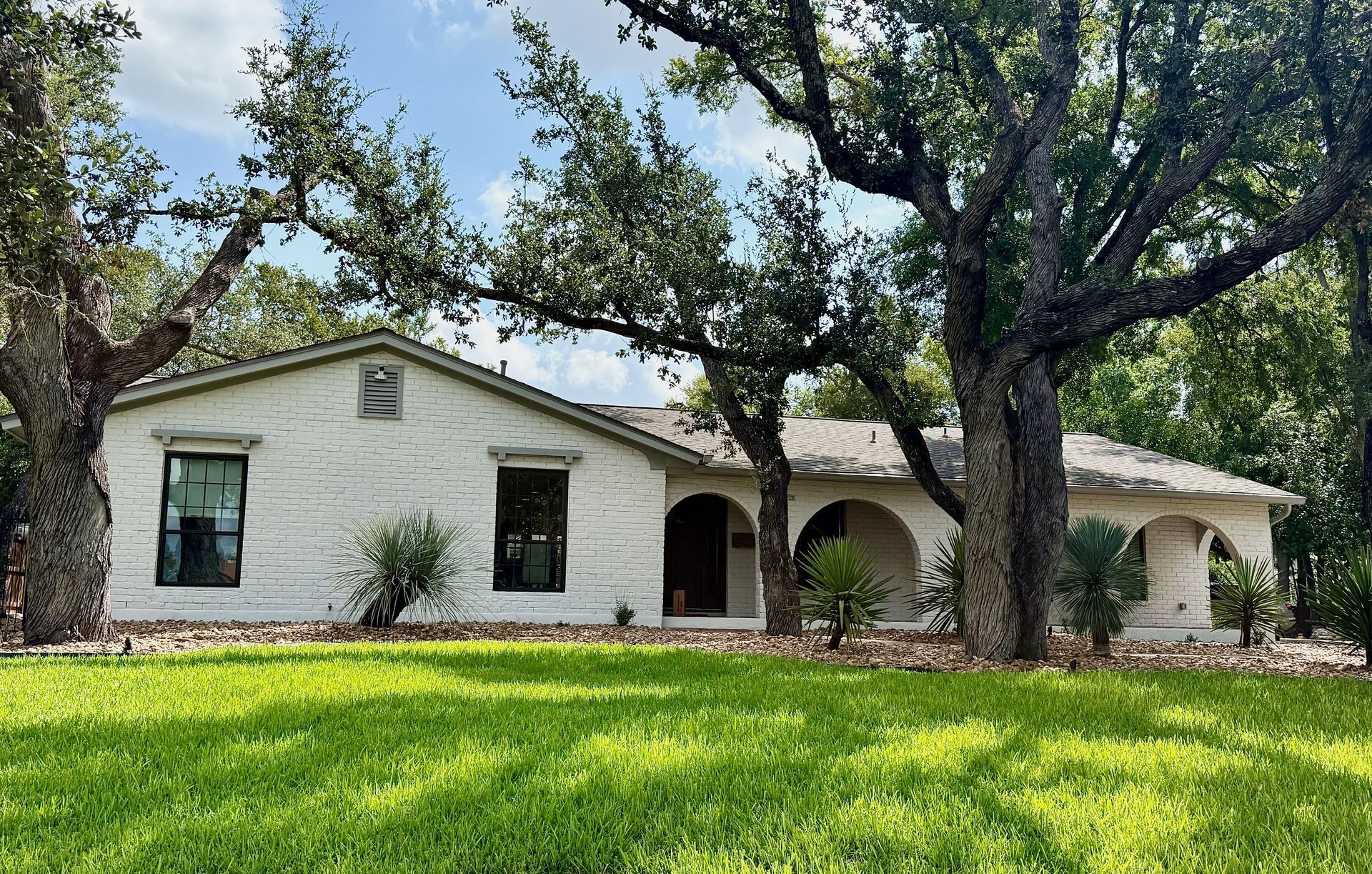 Exterior painting project in Northwest Hills Austin completed for a repeat client of Austin Painting and Cabinets