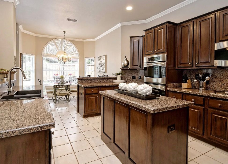 Austin kitchen before remodel in River Place with dated layout and finishes