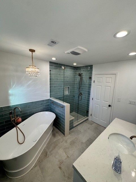 bathroom remodel in austin tx including new shower, tub, and vanity