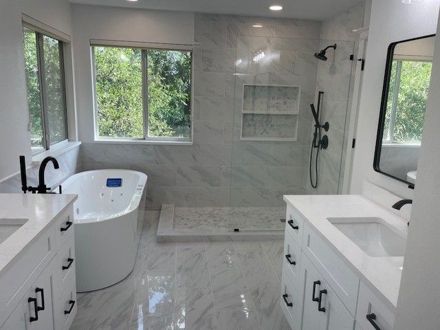 bathroom remodel in austin tx including new shower, tub, and vanity