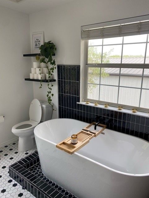 bathroom remodel in austin tx including new shower, tub, and vanity