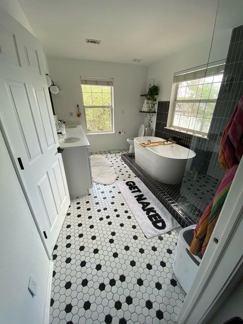 after lake travis bathroom remodel walk in shower freestanding tub modern design