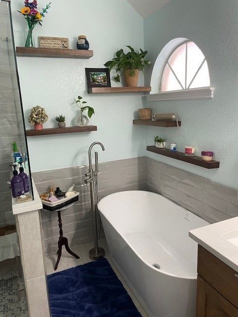 bathroom remodel in austin tx including new shower, tub, and vanity