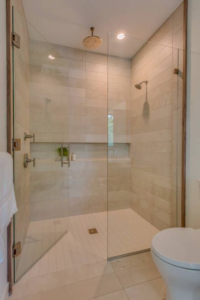 Bathroom remodel design mistakes to avoid in 2026 in Austin, featuring walk-in shower layout, vanity storage, and lighting planning