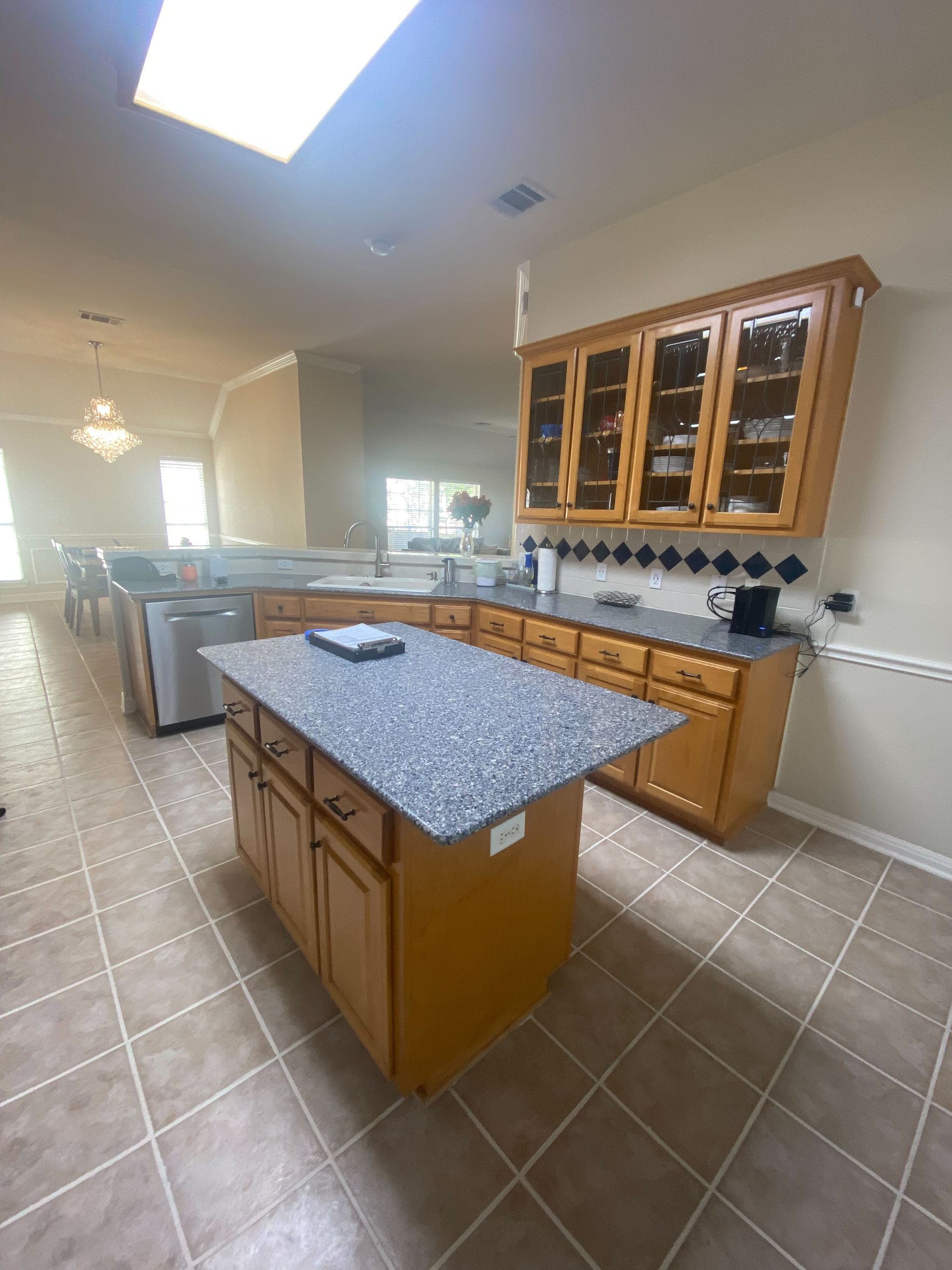 Austin kitchen before remodel with raised bar and outdated cabinets in Canyon Creek