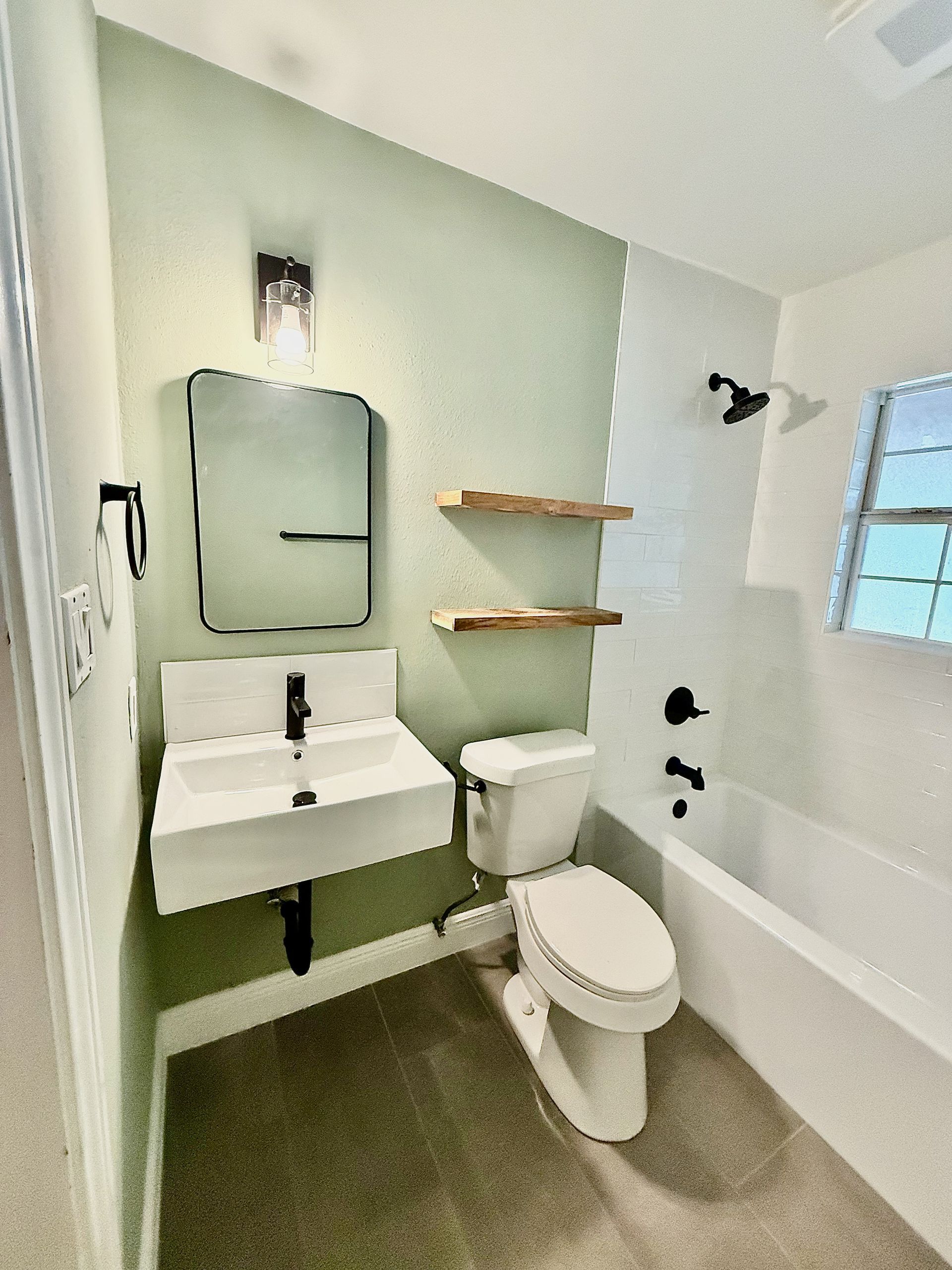Bathroom remodel in East Austin completed for a repeat client of Austin Painting and Cabinets