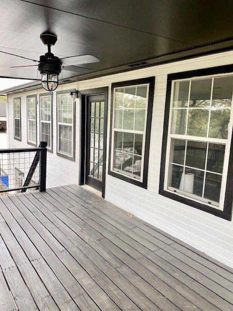 Home in Lake Travis area of Austin, TX that had full kitchen remodel including new cabinets, new countertops, new backsplash, and whole house interior painting and exterior painting completed by Austin Painting and Cabinets