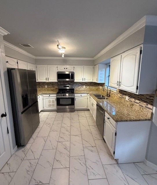 Northwest Austin kitchen before remodel with outdated cabinets and finishes