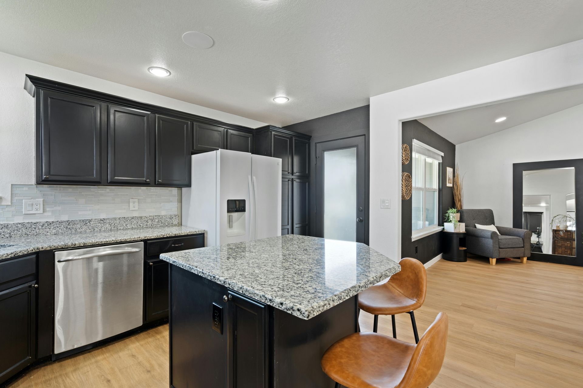 Kitchen in Lakeway TX with newly completed cabinet painting by Austin Painting and Cabinets