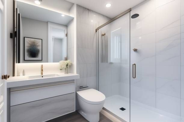 Small bathroom remodel in Austin with tub-to-shower conversion, frameless glass, new vanity, tile, lighting and paint