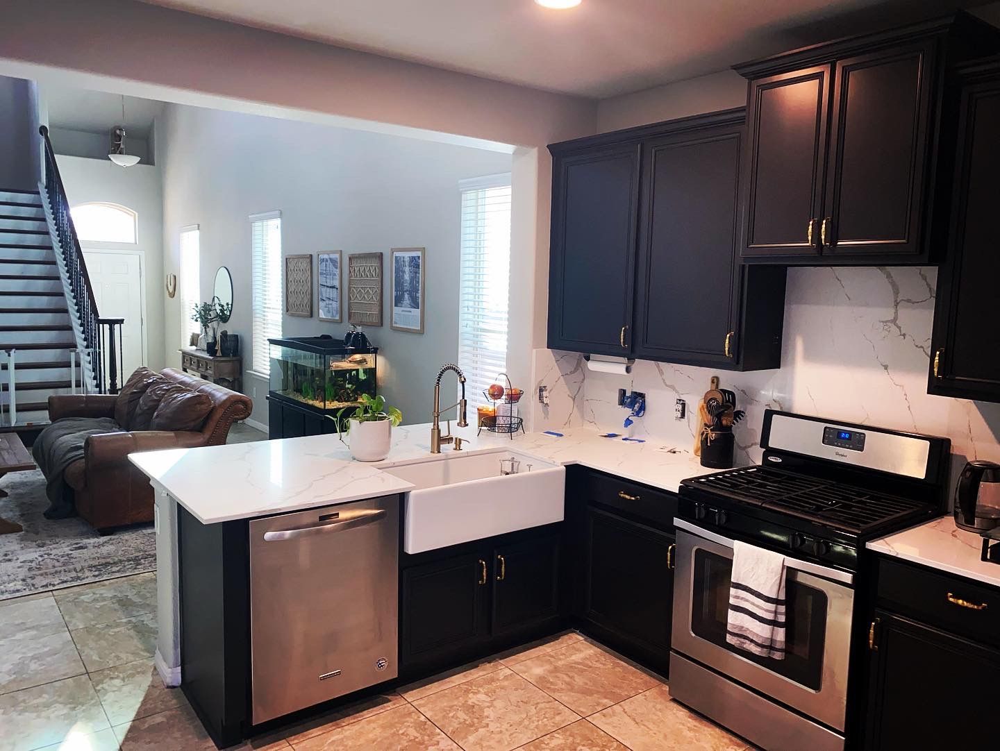 South Austin kitchen remodel with painted cabinets quartz countertops backsplash and open layout