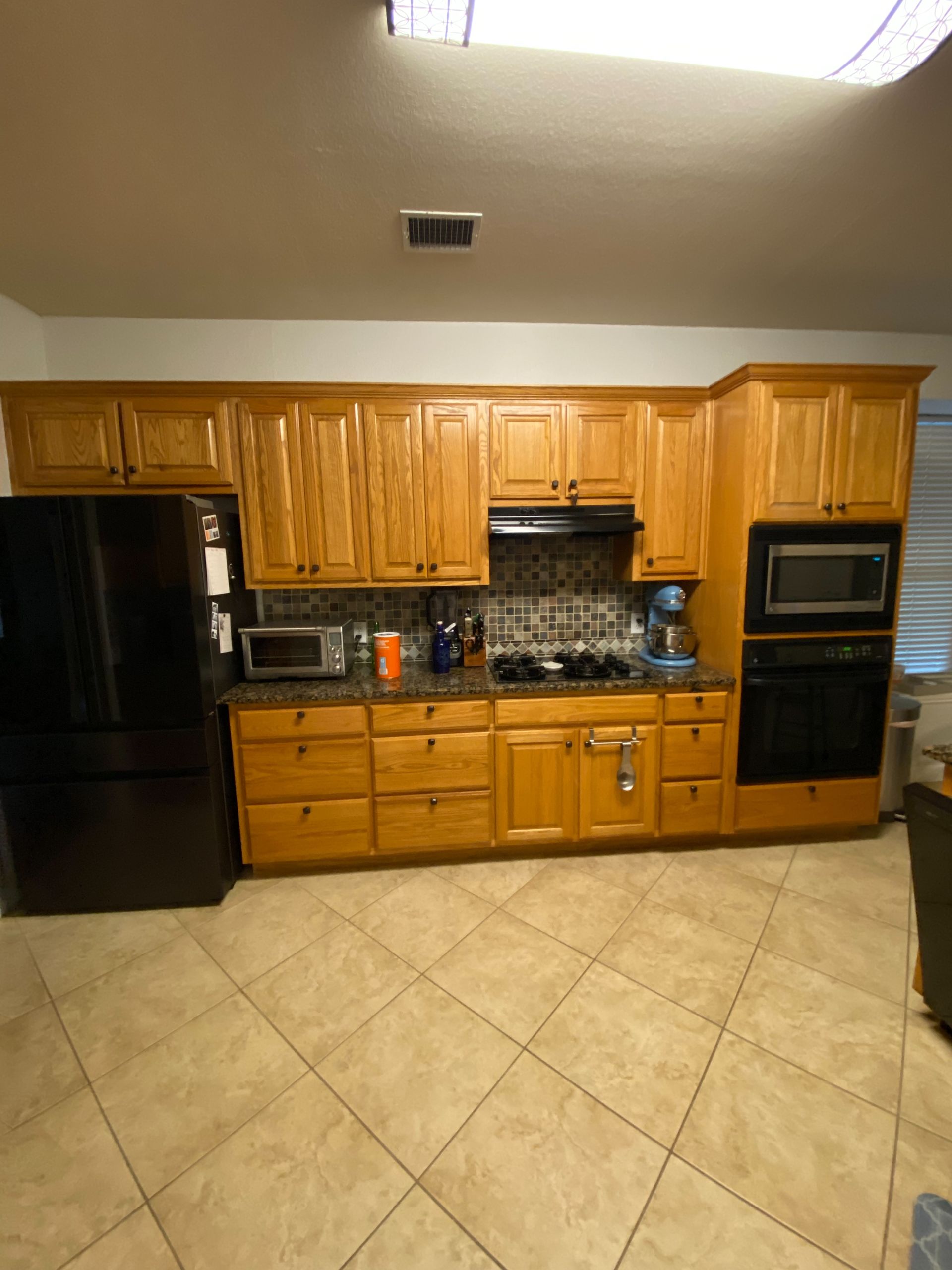 South Austin kitchen before remodel with dated cabinets and countertops