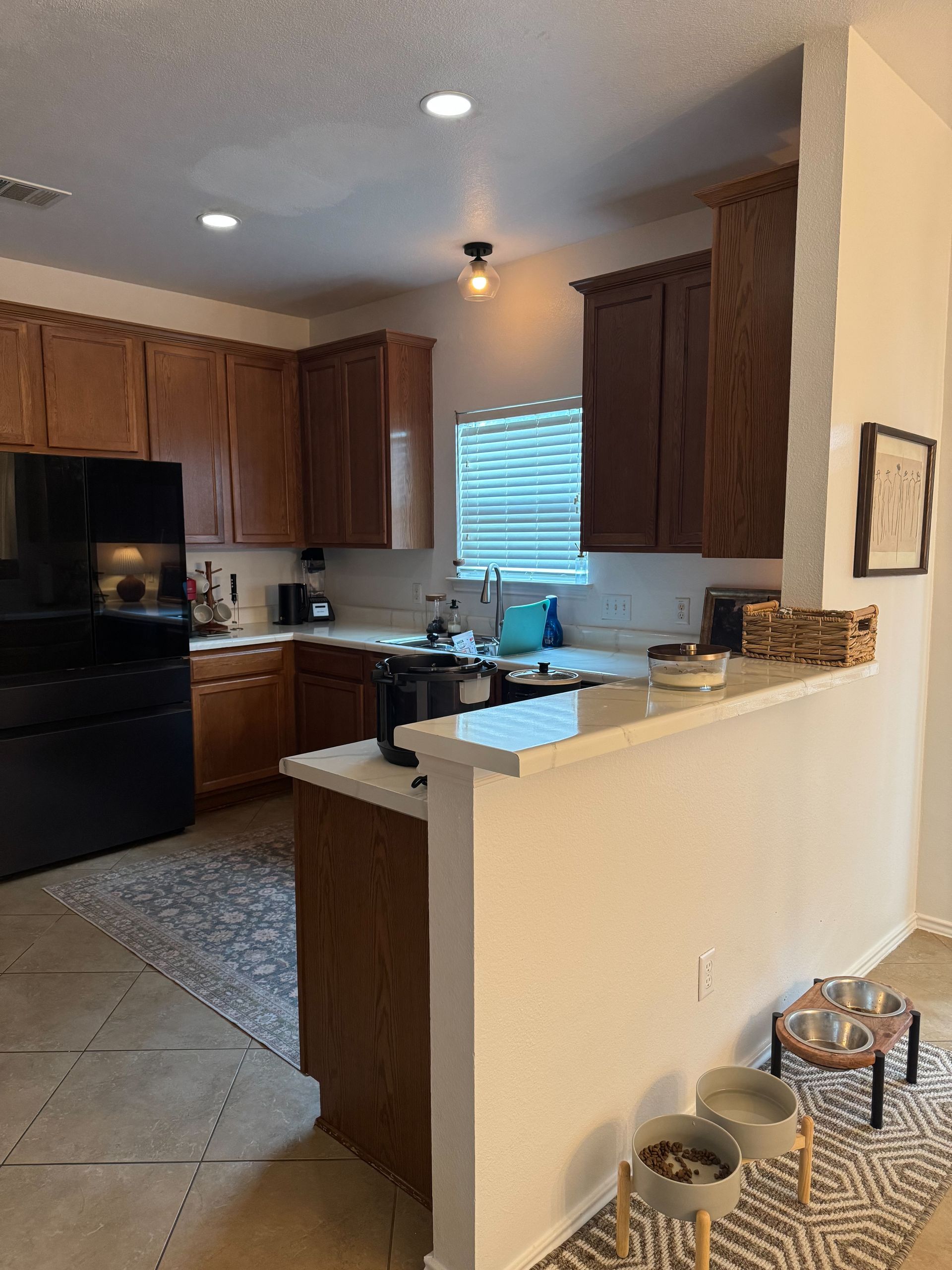 South Austin kitchen before remodel with raised bar top and dated finishes