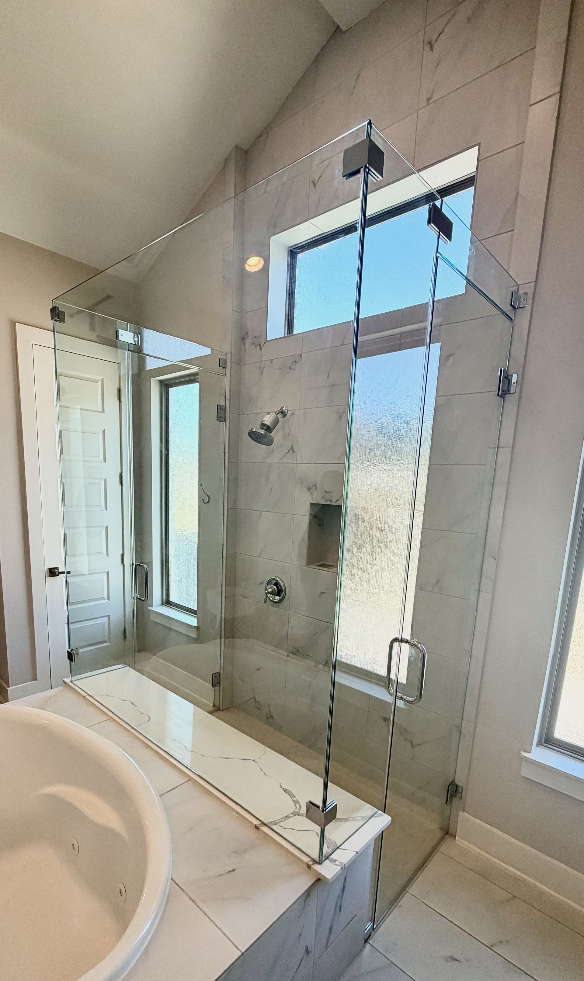 Southwest Austin bathroom remodel with quartz countertops custom mirrors and updated vanity lighting