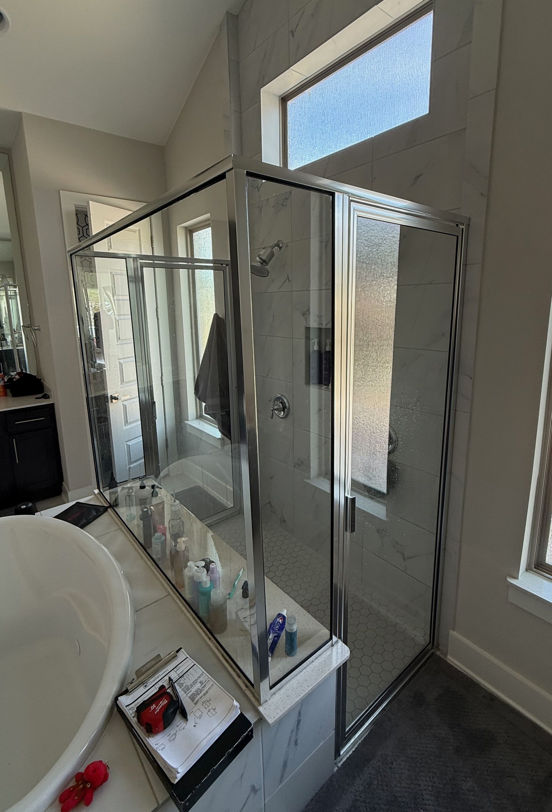 Bathroom before remodel in Southwest Austin with older shower and vanity area