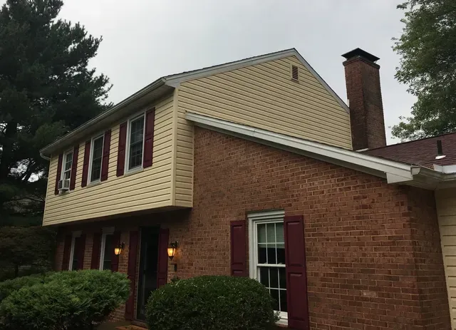 Power washing a house