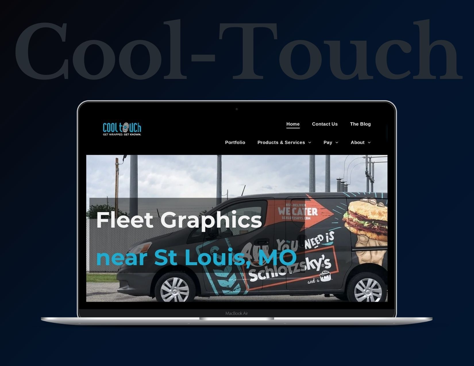 a laptop is open to a website for fleet graphics near st. louis .