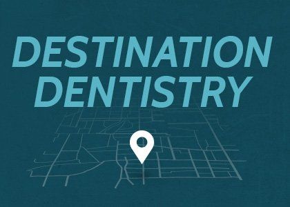 A blue background with the words destination dentistry and a map pin.
