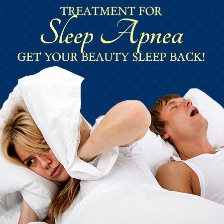 A woman is covering her ears while a man snores in bed