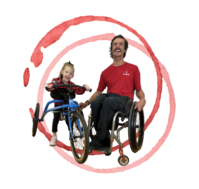 Pairing with ParaSport logo, athlete in a wheelchair beside a girl on a trike