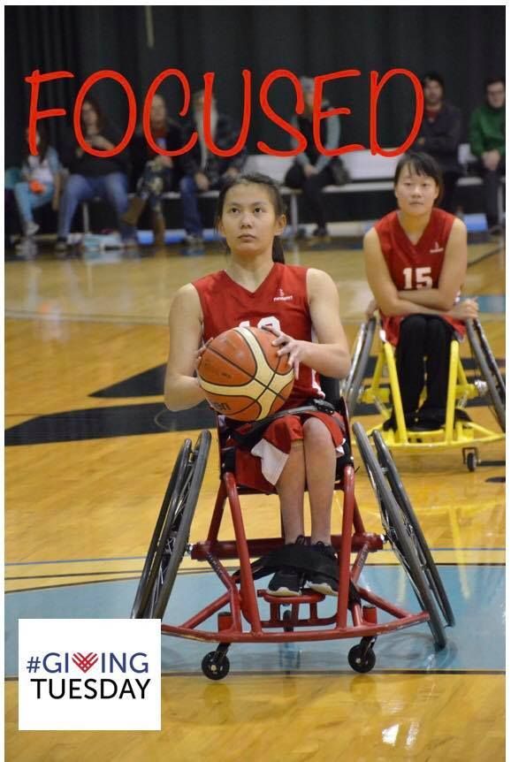 Player sets up a shot under the word Focused, #GivingTuesday