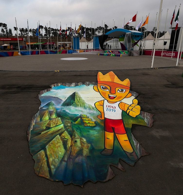 Street art of the Lima 2019 mascot over a Machu Picchu scene, flags behind