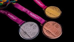 Lima 2019 Parapan Am Games gold, silver and bronze medals on pink ribbons