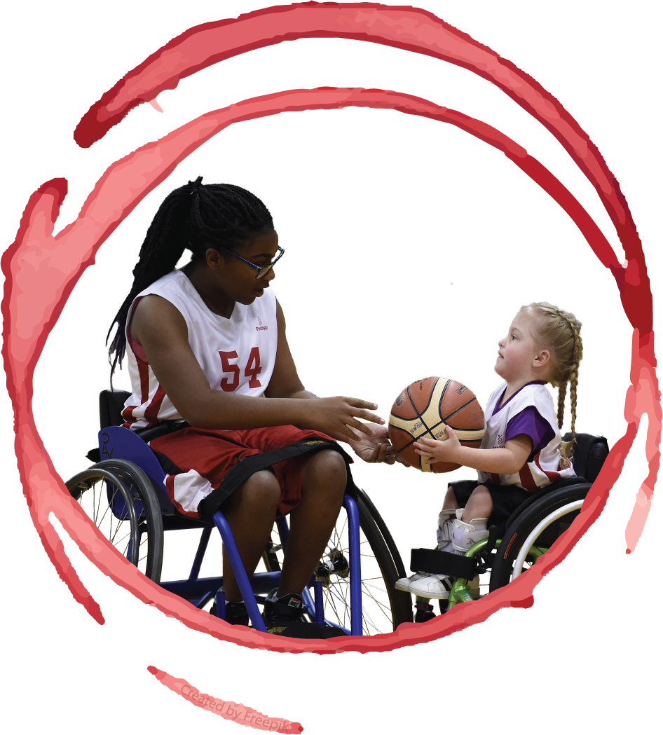 Wheelchair basketball player in jersey 54 hands a ball to a small child
