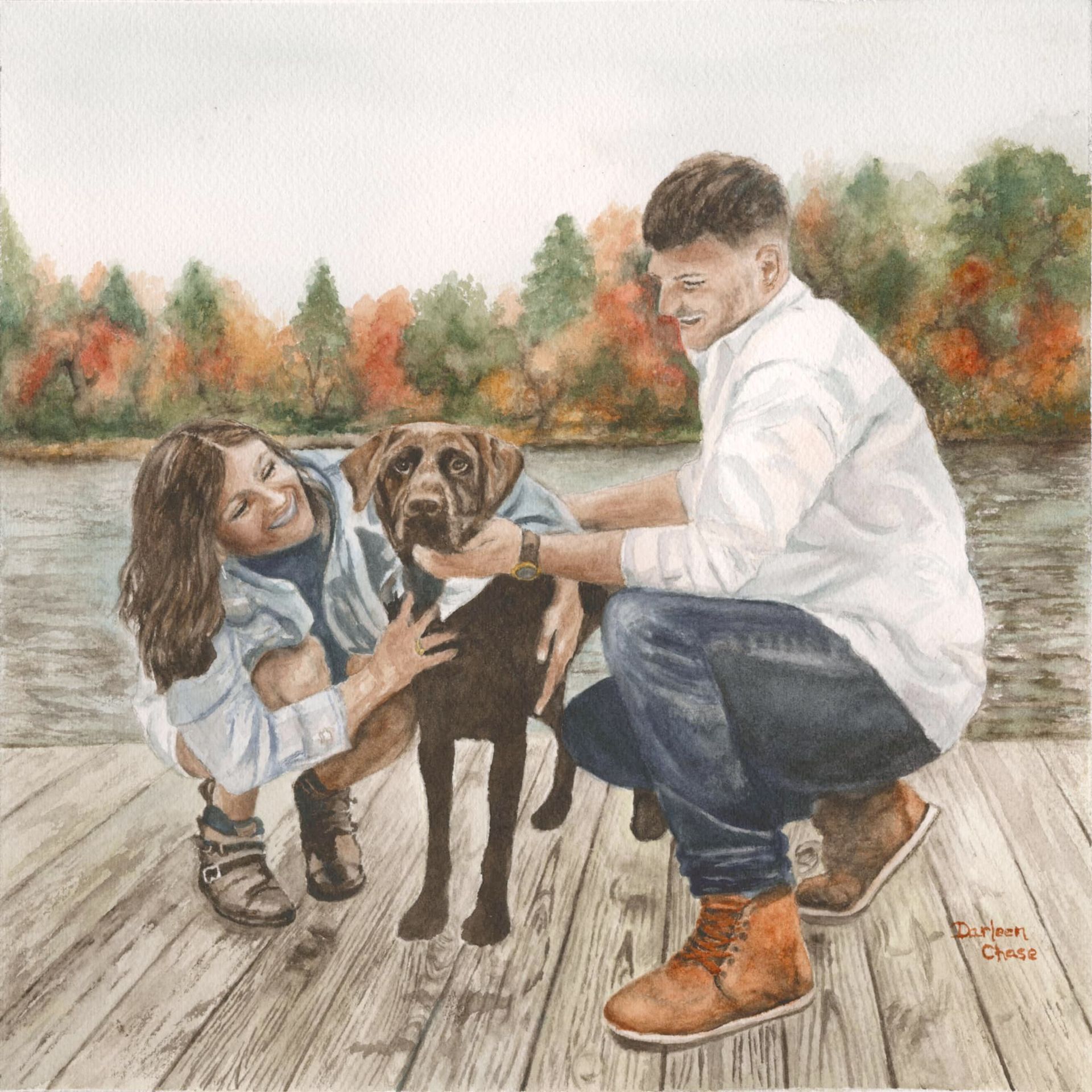 Girl and man kneel with a black dog on a wooden dock by a lake in autumn.