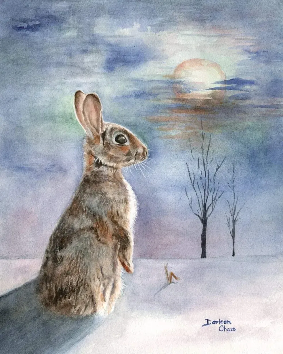 Rabbit in snowy field under a cloudy moonlit sky with bare trees.