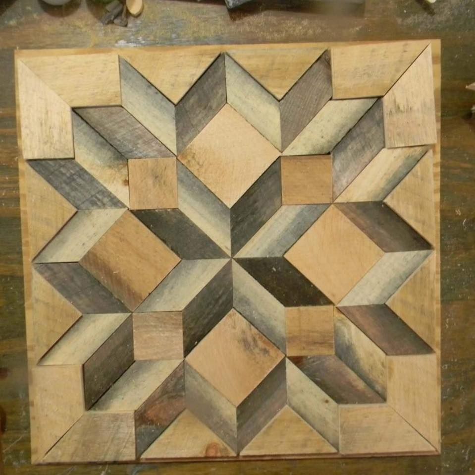 Geometric wooden puzzle with a star-like pattern in tan, gray, and black tones
