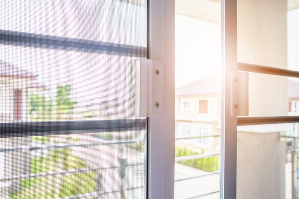 Mosquito Net Wire Screen on House Window Protection — Coastal Screens & Glass in Laurieton, NSW