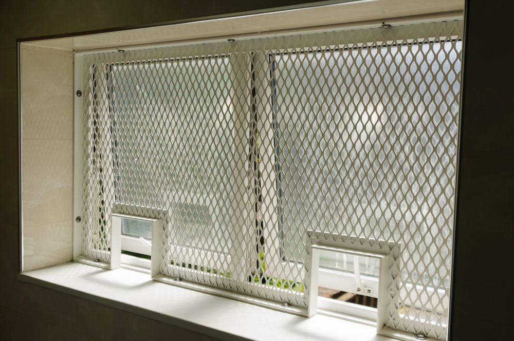 Security Grill on The Window — Coastal Screens & Glass in Laurieton, NSW