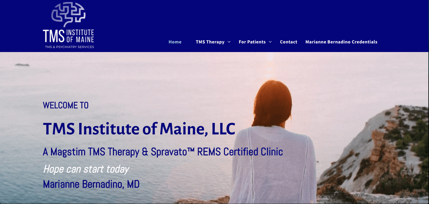 The website for the tms institute of maine , llc shows a woman looking out over the ocean.