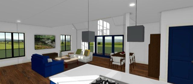 Modern open-plan living room with blue sofa, white chairs, large windows, and a dining area