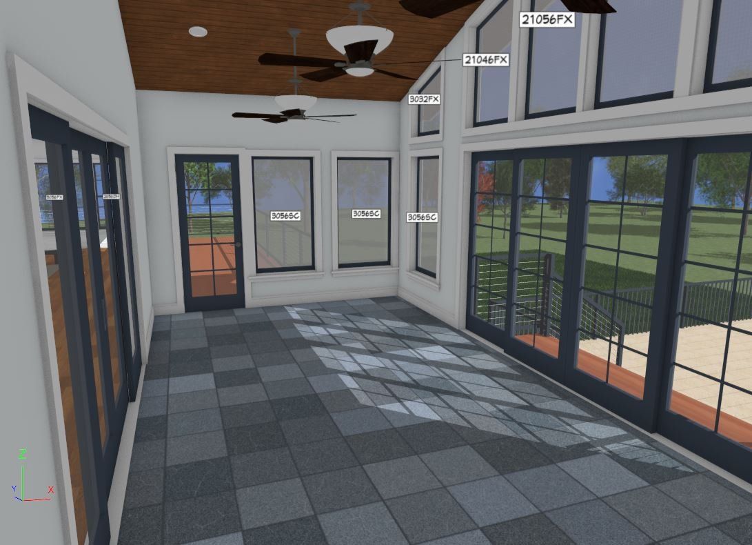 Bright sunroom with tiled floor, ceiling fans, and large windows overlooking green grass and a patio.