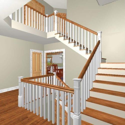 Interior staircase with white balusters, wood handrails, and wood steps in a bright home entryway