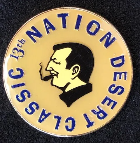 A coin that says 13th nation desert classic on it