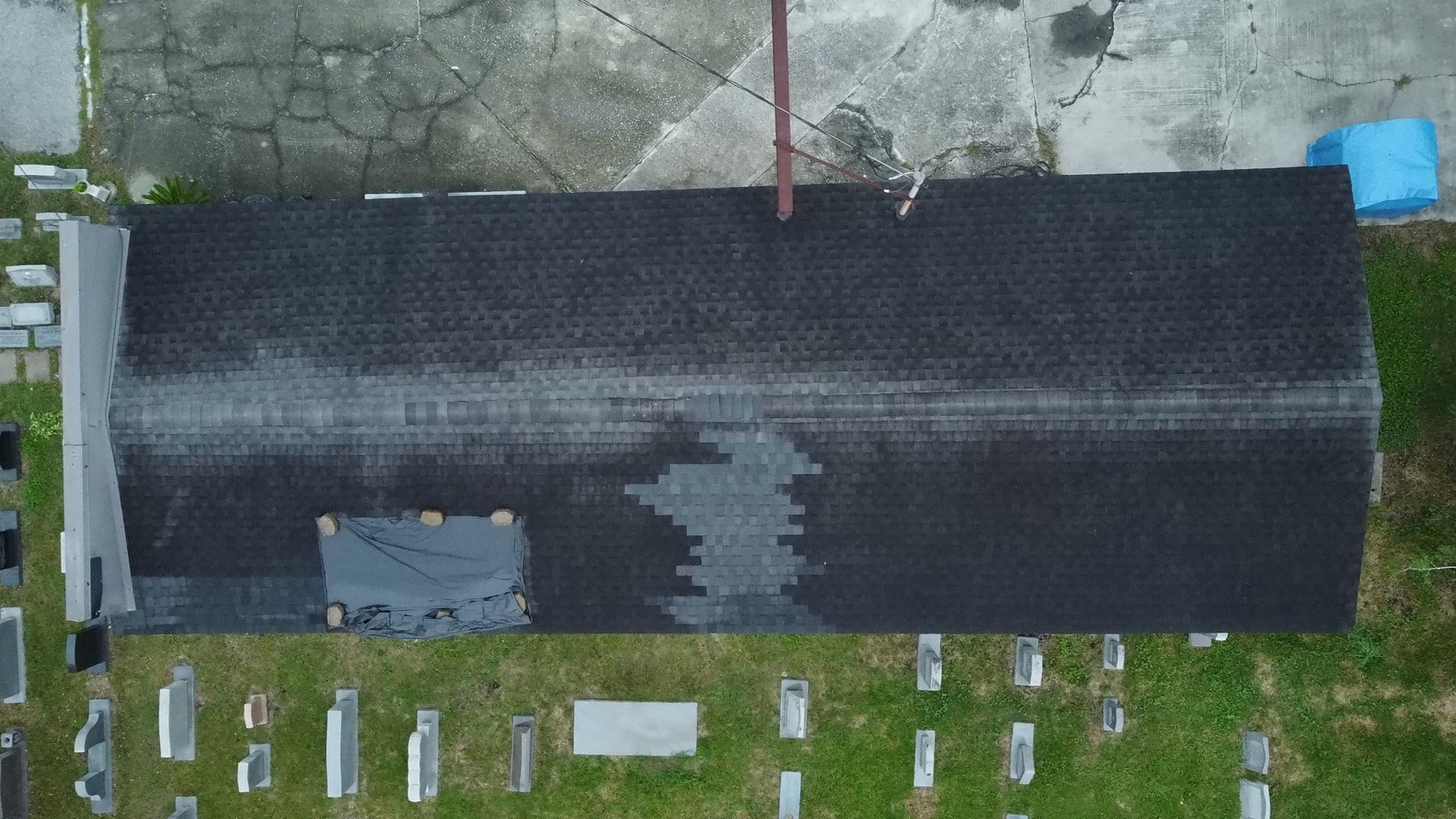 Straight-down view of the old shingle roof before replacement