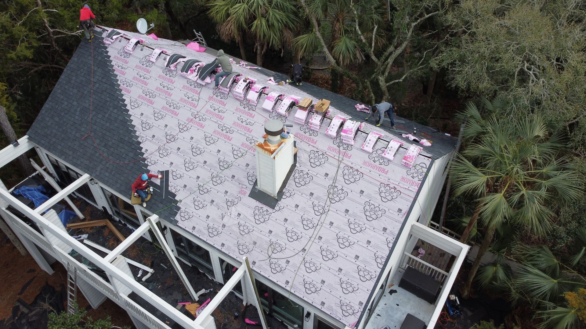 Shingle installation in progress on a Charleston-area porch home