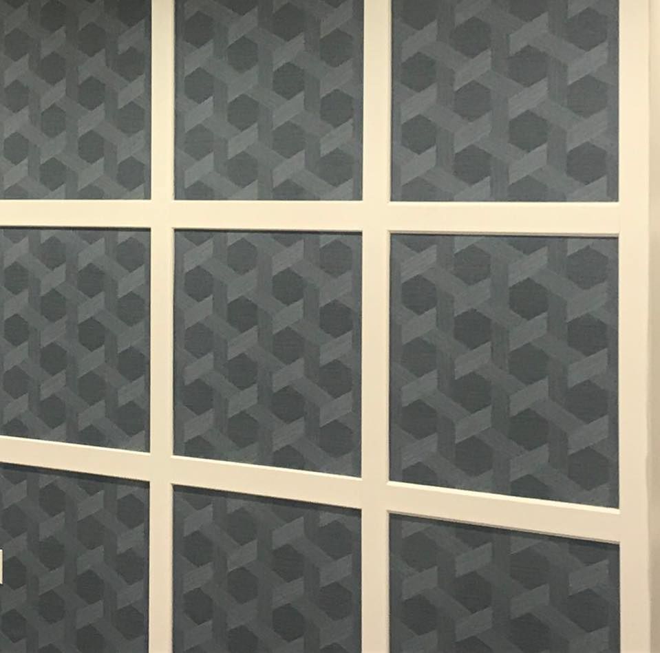 A close up of a window with a pattern on it.