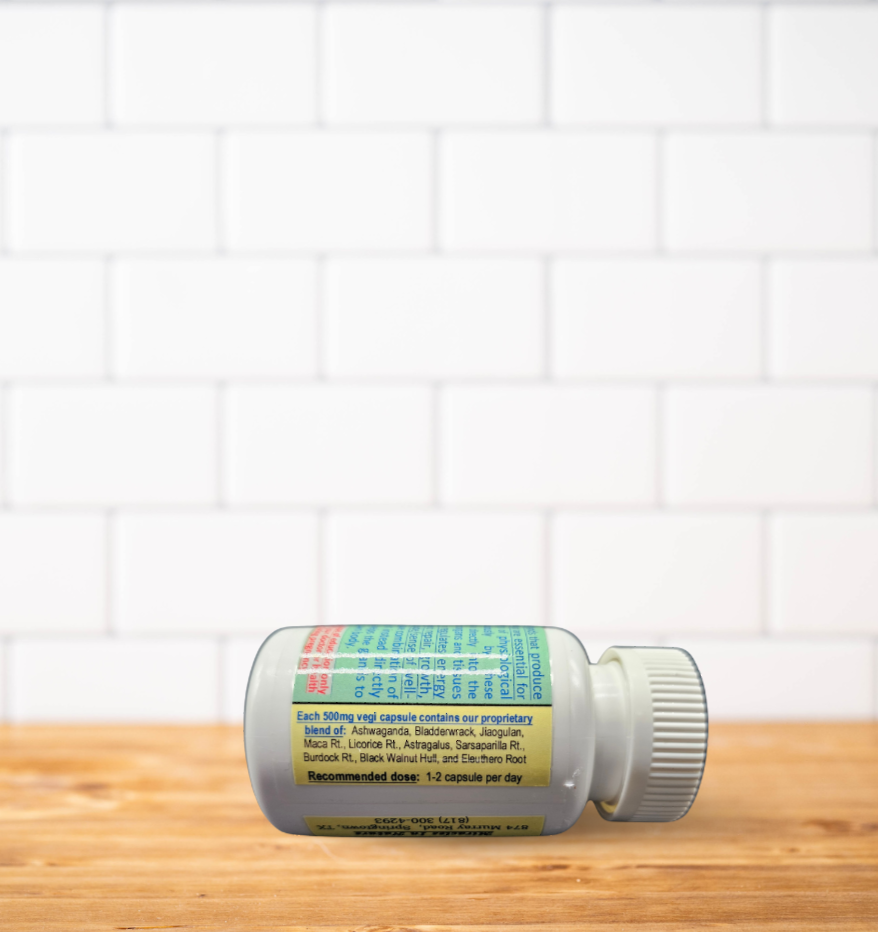 A bottle of pills is sitting on a wooden table.