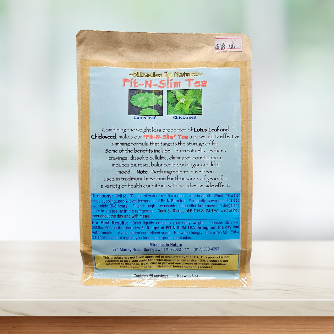 A bag of fit-n-slim tea is sitting on a wooden table.