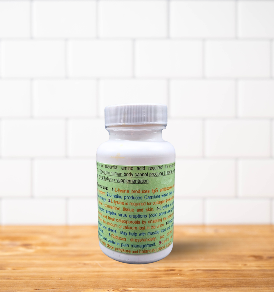 A white bottle of pills is sitting on a wooden table.