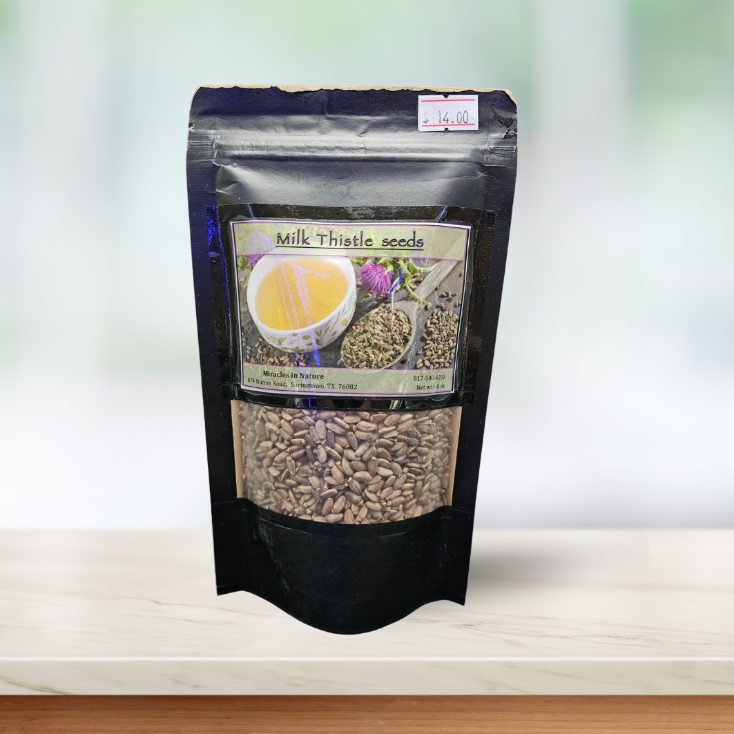 A bag of seeds is sitting on a wooden table.